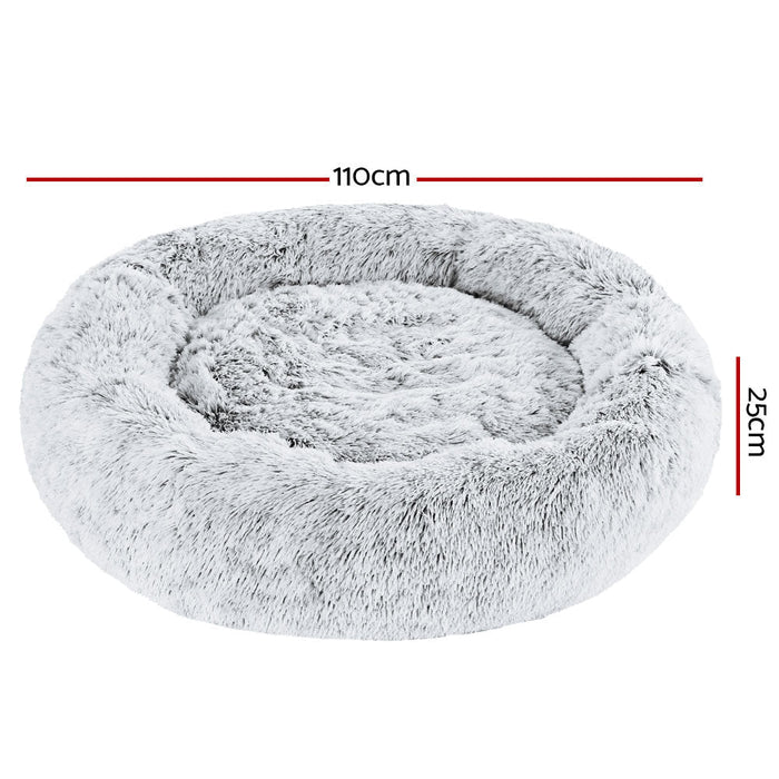 A large grey cushioned pet bed for both cats and dogs 